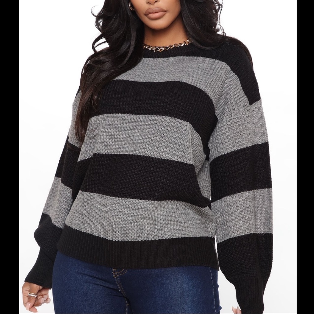 Grey/black sweater.